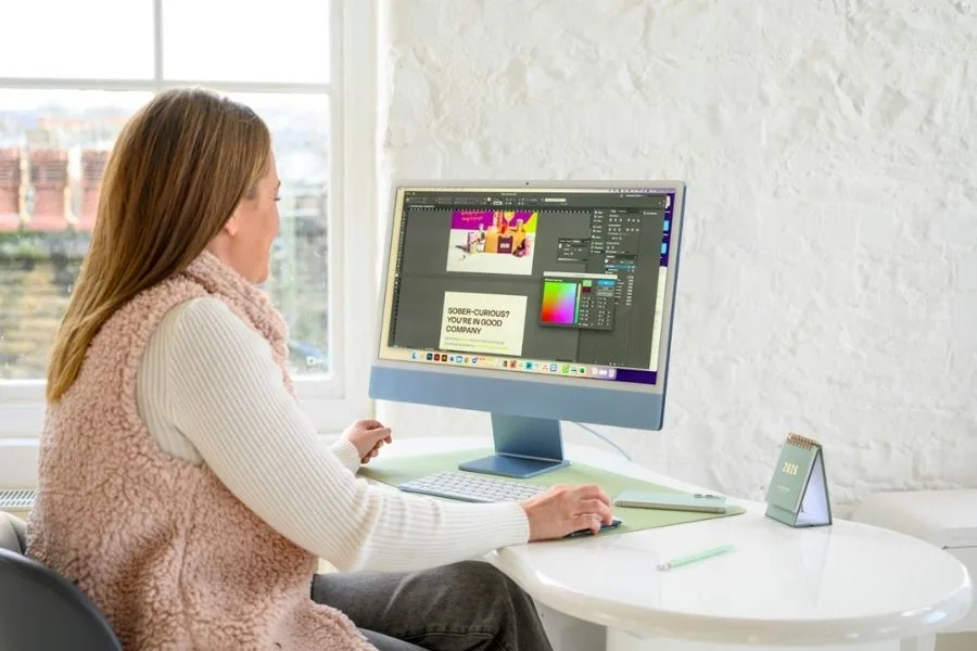 Founder working at desk in studio